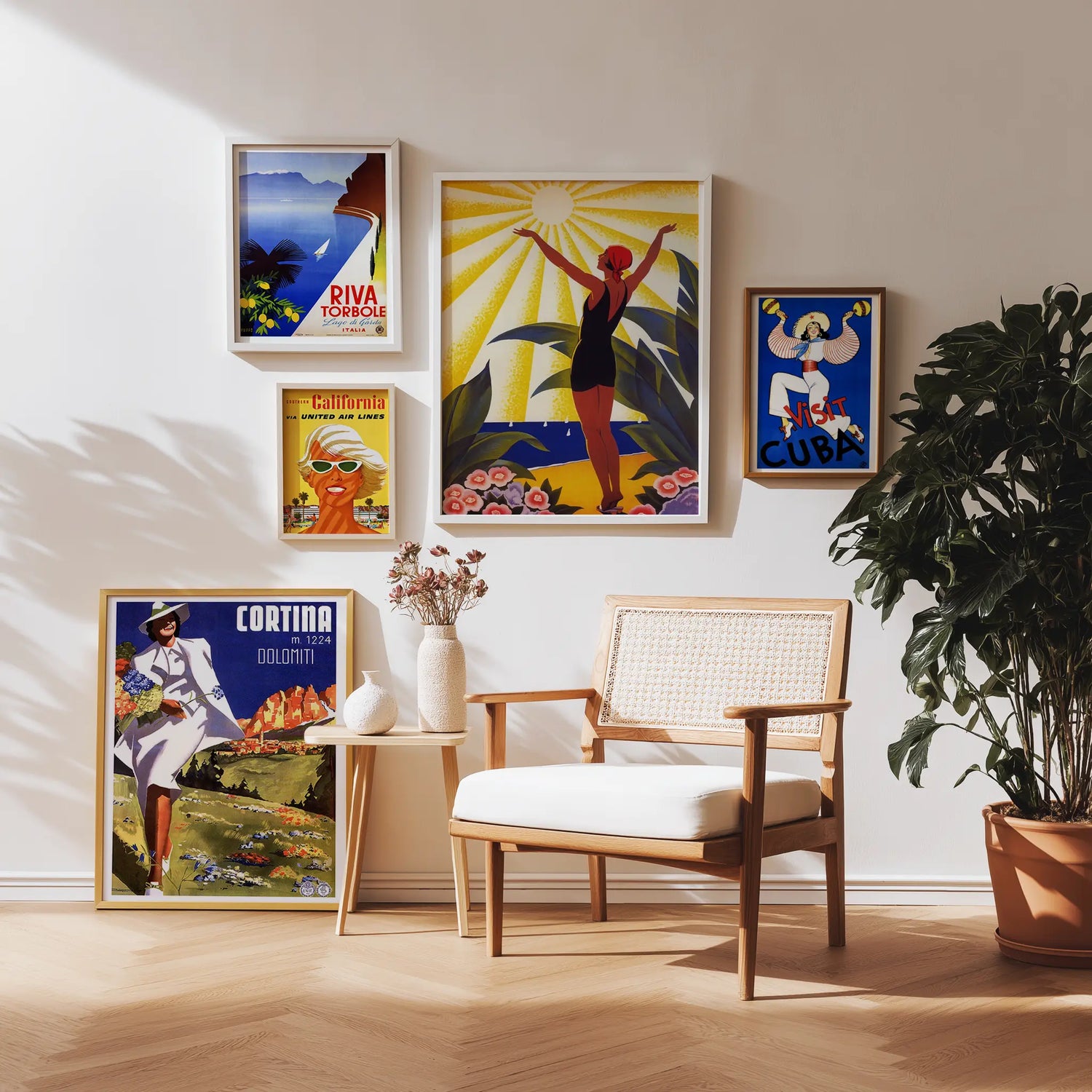 Living room with vintage-style posters on the wall, a wooden chair, and a potted plant.