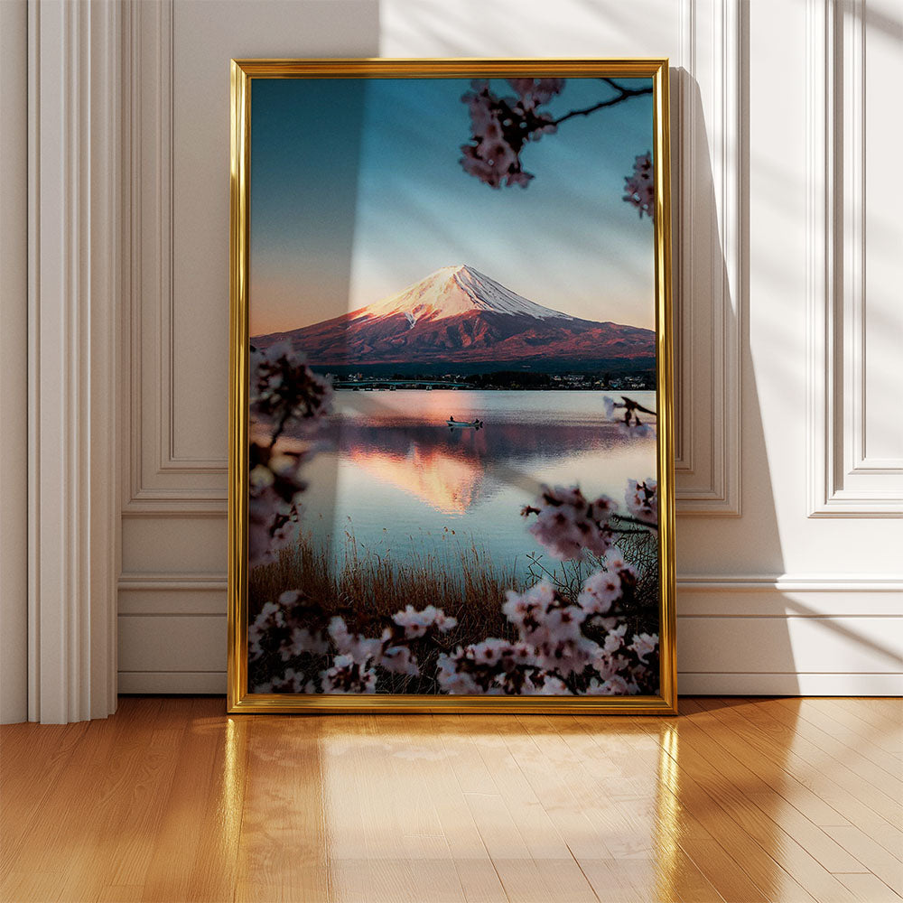 Framed photography of Mount Fuji and cherry blossoms. The frame stands on the floor.