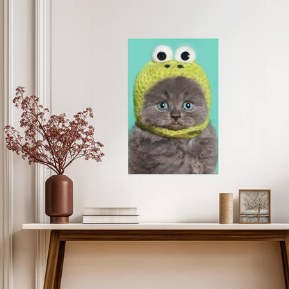 Funny Gray Kitten in a Green Frog Hat | Cute Animal Photography | Humorous Pet Poster - Photography Poster