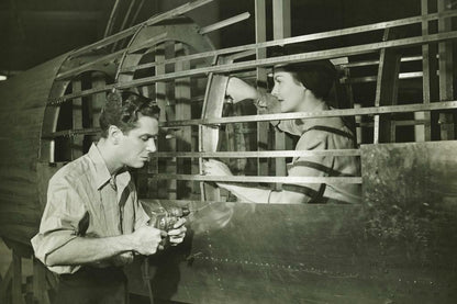 Man and Woman in an Airplane Factory | WWII Era Black and White Photo | Historical Poster - Vintage & Retro Poster