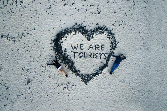 "We Are Tourists" Written in Stones on a Beach | Aerial Drone Photography | Romantic Travel Poster - Photography Poster