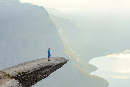 Hiker on Trolltunga Cliff Poster | Norway Adventure Photography | Scenic Landscape Wall Art