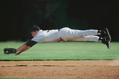 Baseball Player Mid-Air Catch | Dynamic Sports Photography | Defensive Play Poster - Sports Poster
