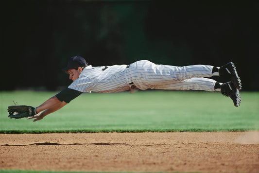 Baseball Player Mid-Air Catch | Dynamic Sports Photography | Defensive Play Poster - Sports Poster