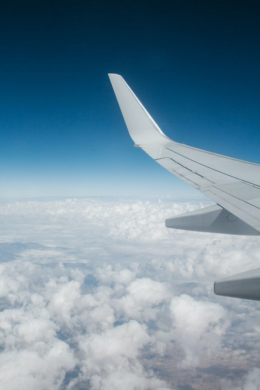 Airplane Wing View Above Clouds | Travel Photography Poster | Window Seat Sky Art Print - Cars Poster