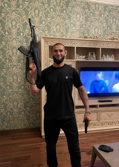 Khamzat Chimaev Holding Guns | MMA Fighter Poster | Combat Sports Wall Art - Sports Poster