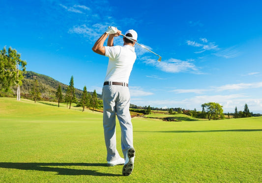 Golfer Mid-Swing on a Lush Fairway | Scenic Sports Photography | Golf Lover Gift Poster - Sports Poster