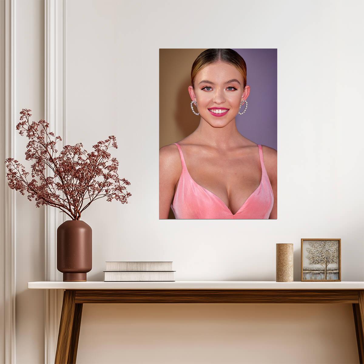 Sydney Sweeney Pink Outfit | Smiling Portrait with Heart Earrings | Celebrity Star Poster - Celebrities Poster