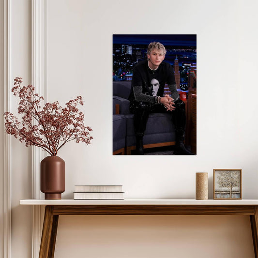 Machine Gun Kelly Sitting on Couch | Black Graphic Tee & Vinyl Pants | Music Interview Poster - Music Poster