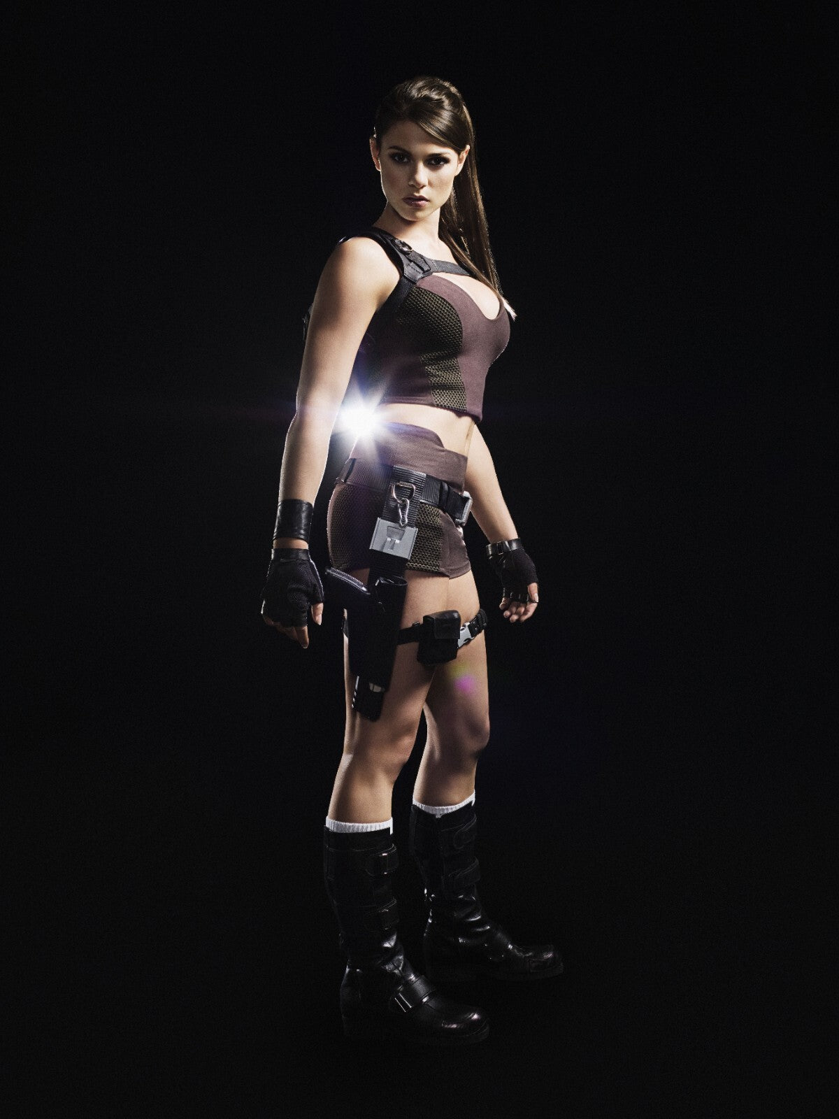 Tomb Raider Poster | Lara Croft in a Black Outfit with a Flashlight - Video Games Poster