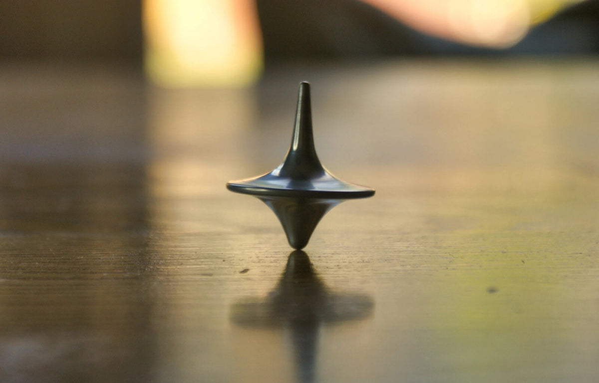Inception Movie Poster | Spinning Top in Soft Focus - Movies & TV Poster