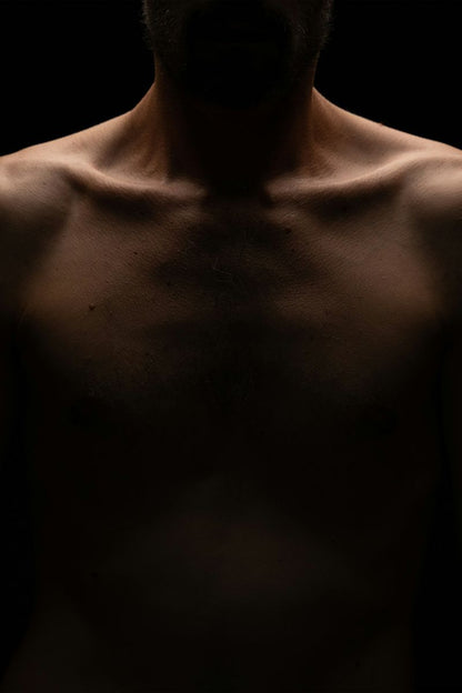 Male Torso Poster | Warm Light and Shadow - Photography Poster